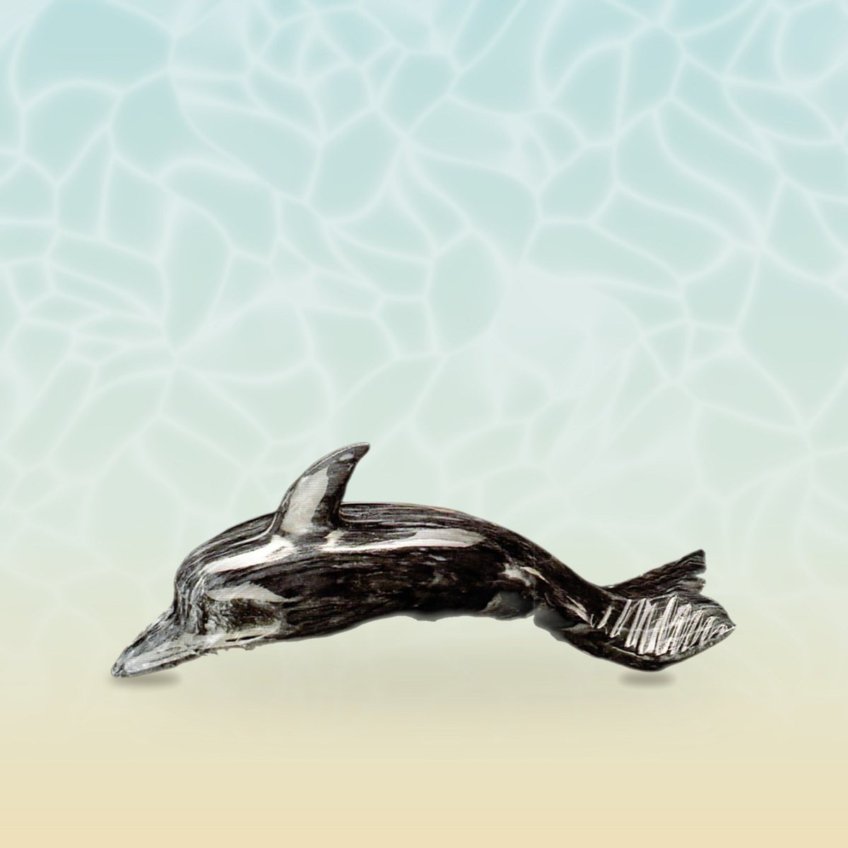 Hand-carved marble diving dolphin from the original Trinity catalogue